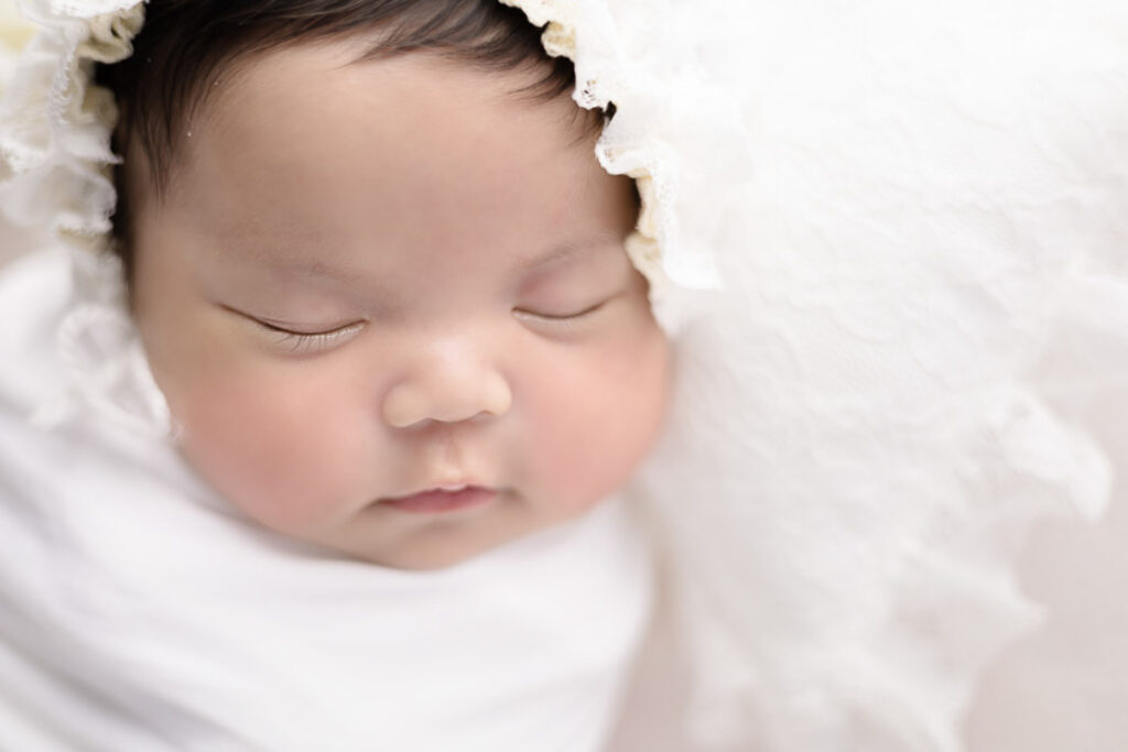 Newborn Photographer- newborn girl sleeping 