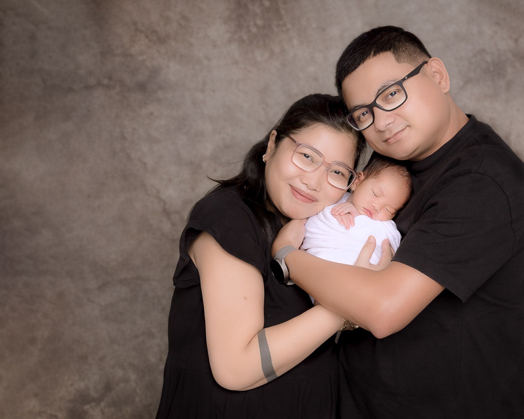 Nany Services in Manila topic. Husband and wife photo with their newborn baby