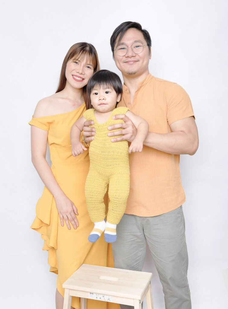 pediatrician family of three wearing yellow