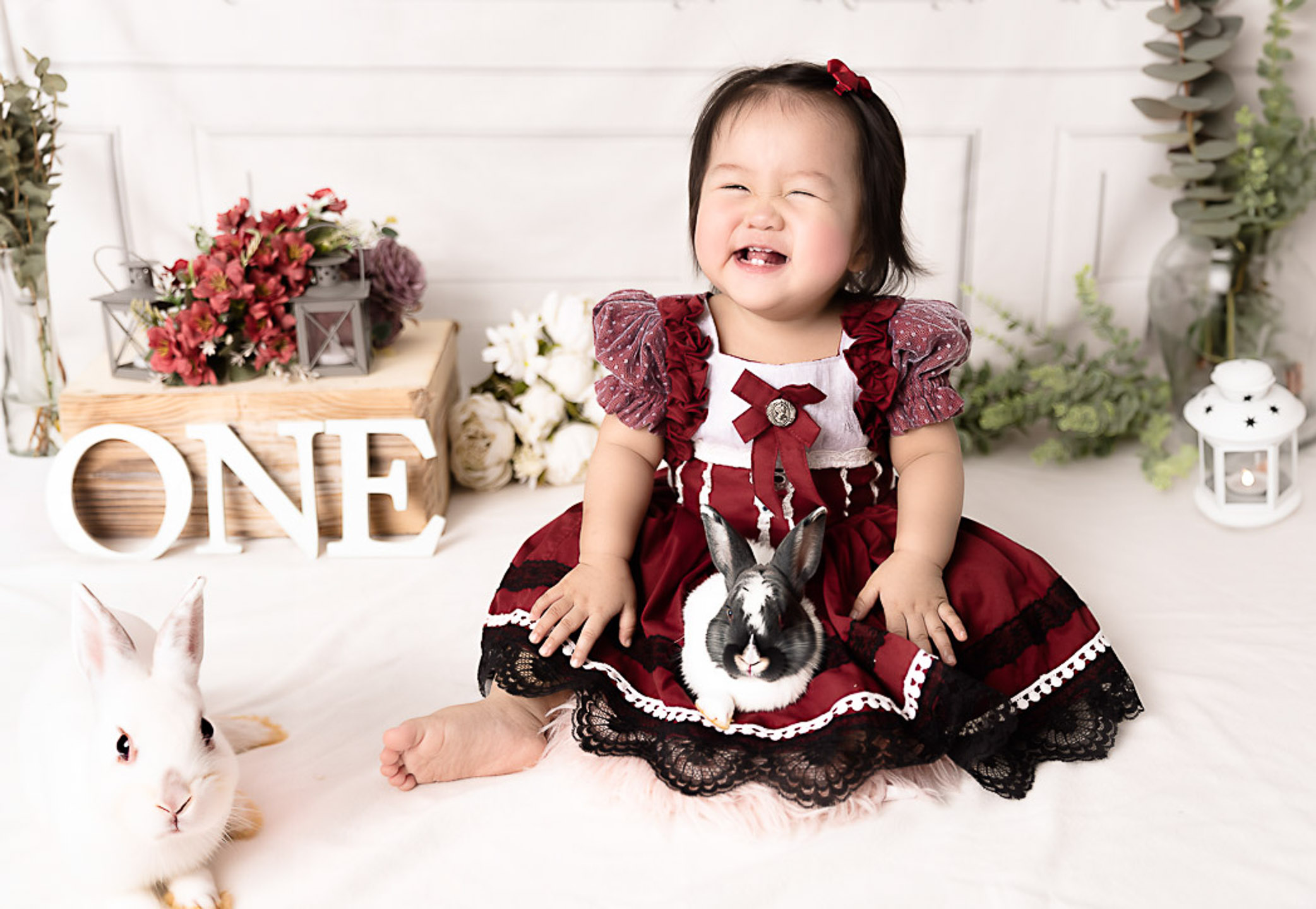 Where to Buy Baby Clothes in Manila. Baby smiling wearing red victorian dress